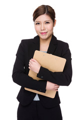 Asian Young businesswoman hold with clipboard