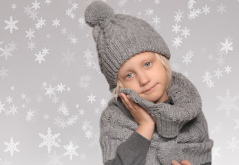 cute little boy, warmed his cheek a soft and warm shawl