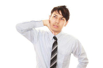 肩こりに悩む男性