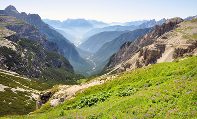 Fototapeta na wymiar Dolomites mountains, view of great valley, Italy