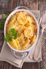 baked potato with cheese and cream