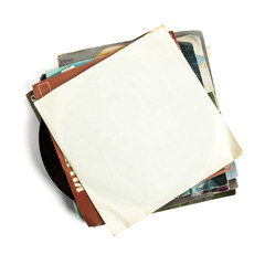 Old vinyl records stack, blank sleeve, isolated on white