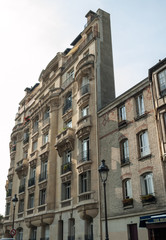 Fototapeta na wymiar Facade of house at the Pantheon Square in Paris,