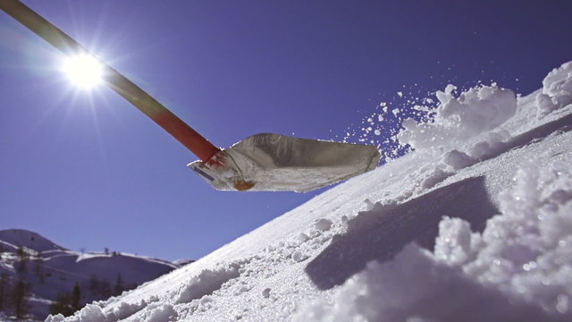 SLOW MOTION: Building a kicker in snow park