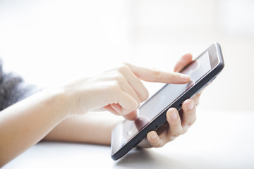 close up woman's hands with tablet. Outdoor