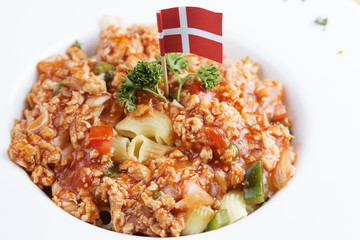 Macaroni with tomato chicken sauce