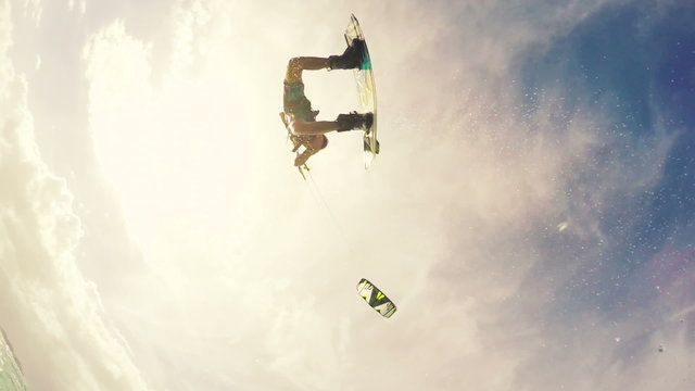 Young Man Catches Huge Kitesurfing in Ocean. Extreme Summer Sport HD. Slow Motion.