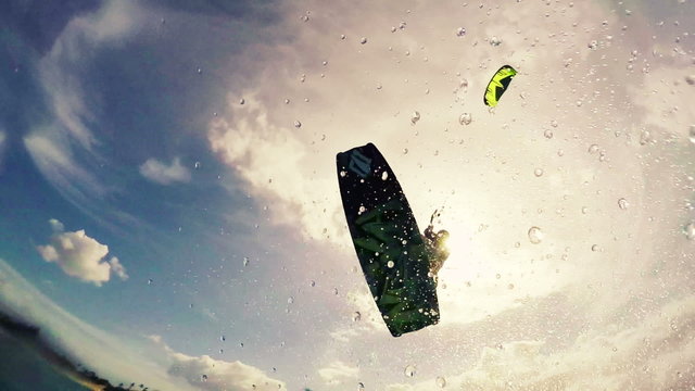 Young Woman Catches Air Kitesurfing in Ocean. Extreme Summer Sport HD. Slow Motion.