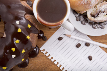 cup of coffee with biscuits