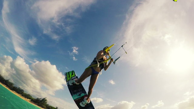 Young Woman Kitesurfing in Ocean. Extreme Summer Sport HD. Slow Motion.