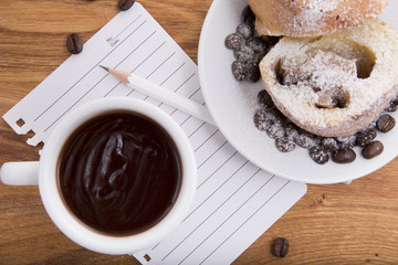 cup of coffee with biscuits