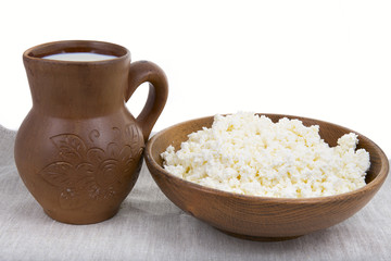 milk and cheese in a clay pot natural
