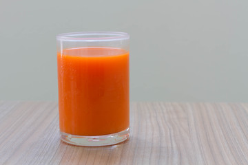 Healthy carrot juice cool drink on the wooden table