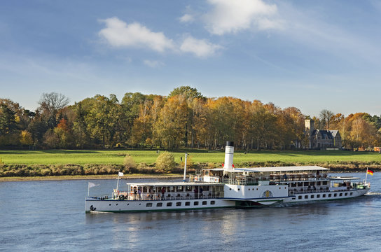 Steamship in Elbe river.Old ship in Elbe river near Dresden in during a bright autumn day.  Saxony,Germany.