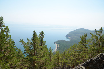 Fototapeta na wymiar The picturesque coastline of the western coast of Lake Baikal. Top view