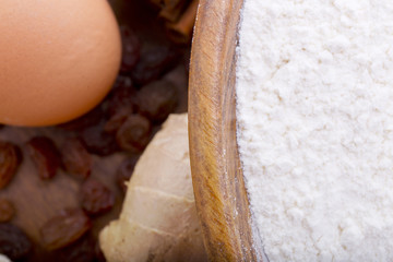 Baking ingredients on a wooden background