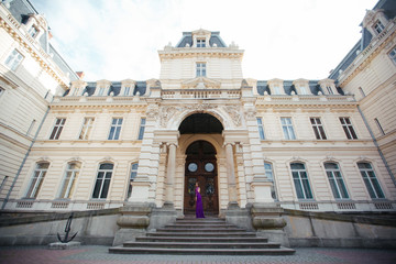 Beautiful brunette young woman wearing fashionable clothes, wond