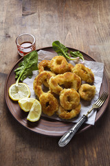 Squid rings, Fried in egg and Lemon. Healthy Mediterranean Appet