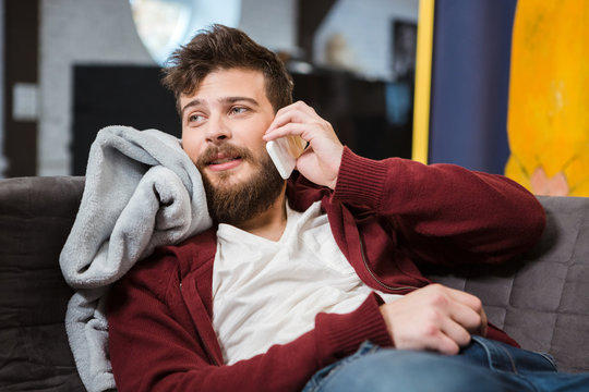Bearded guy talking on cellphone