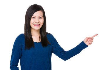 Young asian woman with finger up