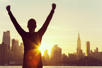 Obraz premium Successful Woman Sunrise New York City Skyline