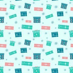 Holiday seamless pattern with colorful Christmas gift boxes on blue background. Vector gifts illustration with ribbon, christmas tree and snowflakes