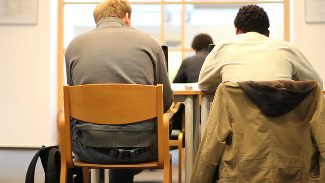 University students take exam and cheat