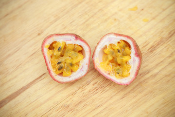 Passion fruit on wooden background