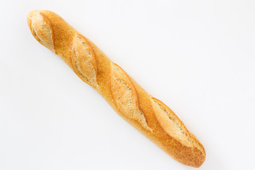 French bread baguette on a white background, made from flour. baking, top view, side view. space for text ..