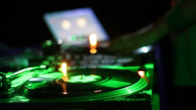  DJ spins records at club 2