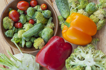 red and yellow bell peppers, cauliflower, tomatoes, cucumber wit