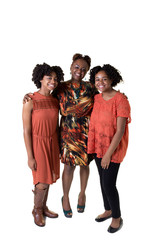 Fototapeta premium A mother and her 2 daughters isolated on white