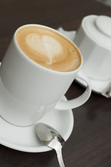 white cup of latte