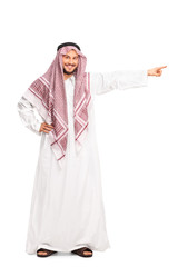 Young Arab in a white robe pointing right