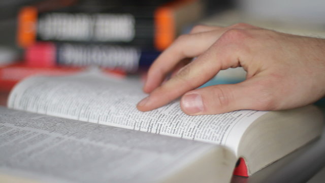 Man goes through dictionary terms