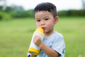 Cute boy drink with water