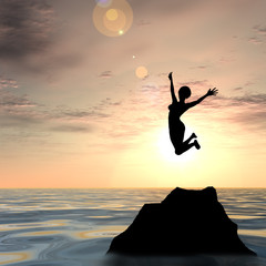 Conceptual woman silhouette jumping at sunset