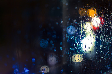 Car Headlights and Streetlights in Rain
