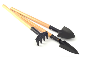 garden shovel and rake on a white background separately