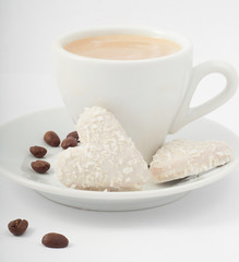 heart shaped cookies with white chocolate with coconut with a mo
