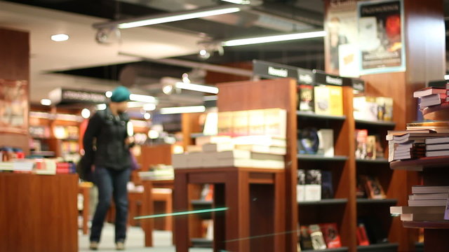 Bookstore shelves with book stacks
