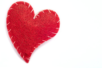 embroidered red heart on a white thread separately