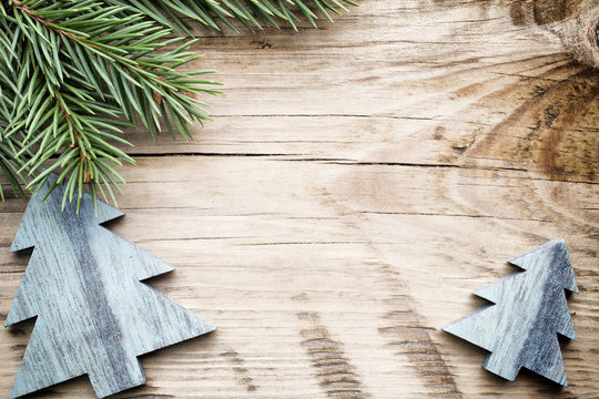 Wood texture with ornament and firtree.