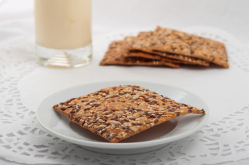 healthy fitness cookies with different seeds on a white tableclo