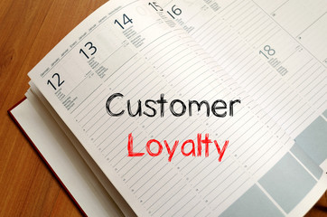 Customer loyalty write on notebook