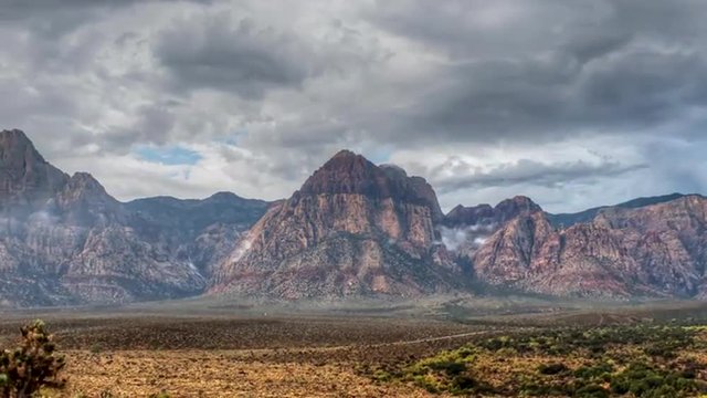 Red Rock Canyon Nevada Moving Storm Clouds Time Lapse with Zoom Out