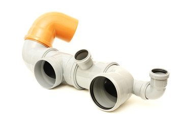 New gray and brown drain pipe, isolated on a white background
