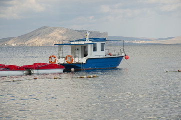 Obraz premium Sudak, motor boat at the pier