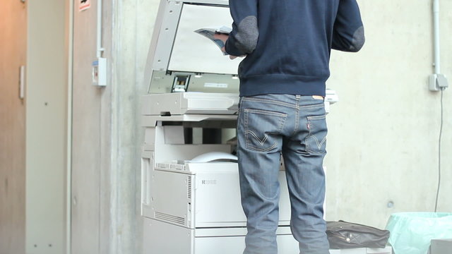 Man uses copy machine