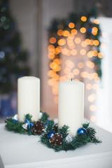 Свечи на фоне камина